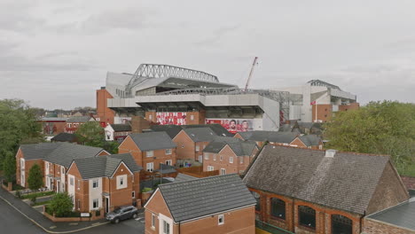 The-Anfield-Arch:-A-sweeping-arch-shot-revealing-the-stadium-and-adjacent-areas,