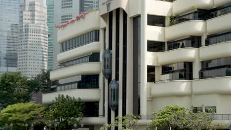External-Elevators-Going-Up-And-Down-On-The-Riverwalk-Building-In-Singapore