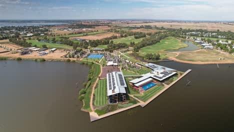 Yarrawonga,-Victoria-Australia---February-10-2022:-Aerial-view-over-Lake-Mulwala-to-the-Sebel-Hotel-and-Black-Bull-Golf-Course-in-the-background