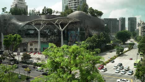 High-Angle-View-Of-ION-Orchard-Shopping-Centre-In-Singapore-On-Orchard-Road-With-Traffic-Going-Past