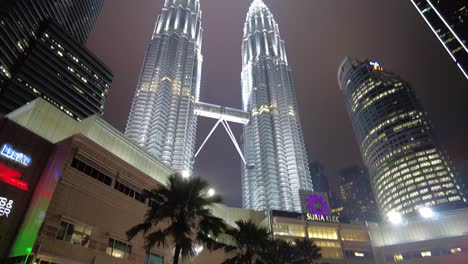 Typical-but-different-editorial-evening-view-of-the-Petronas-Twin-Towers,-once-the-world's-tallest-commercial-building-but-currently-the-third-tallest