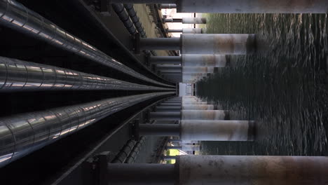 Vertical-video-under-Brücke-"Chelles-Allee",-access-road-to-Lindau,-Germany