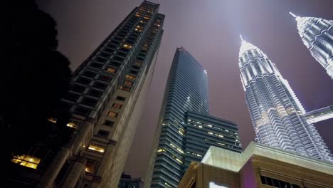 Typical-but-different-editorial-view-of-the-Petronas-Twin-Towers,-once-the-world's-tallest-commercial-building-but-currently-the-third-tallest