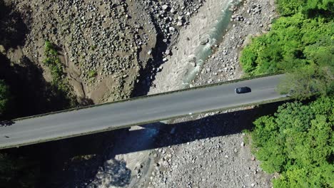 Puente-Rio-Sucio-Transport-Bridge-Over-River,-Costa-Rica-Aerial-Drone-4k