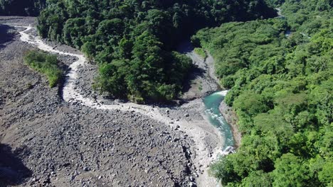 Aerial-Drone-Flyover-Park-Braulio-Lane-National-Park-Und-Rio-Dirty-Bridge,-Costa-Rica-4k