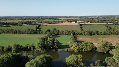 Aerial-view-of-River-Lay-in-France-with-agricultural-fields