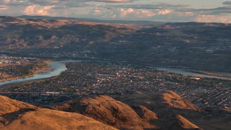 Aerial-Serenity-at-Dusk:-Kamloops-City,-Semi-Arid-Desert,-and-the-Tranquil-Thompson-River