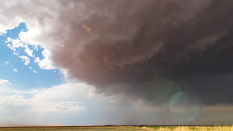 A-land-spout-tornado-touches-down-in-the-Texas-panhandle,-picking-up-dust-and-debris