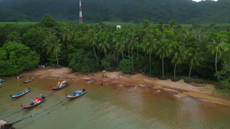 Longtail-boats-anchored-on-northern-coast-of-Koh-Lanta-coastal-fishing-community