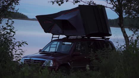 Rooftop-Tent-Near-Lakeshore-During-Sunset.-Close-Up