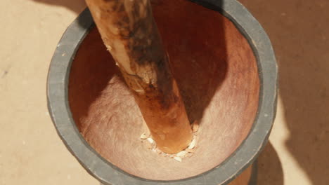 Rustic-mortar-and-pestle-grinding-spices-in-sunlight