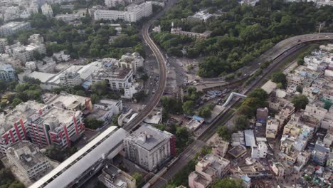 Aerial-video-showing-the-parallel-railway-and-metro-lines-in-Hyderabad