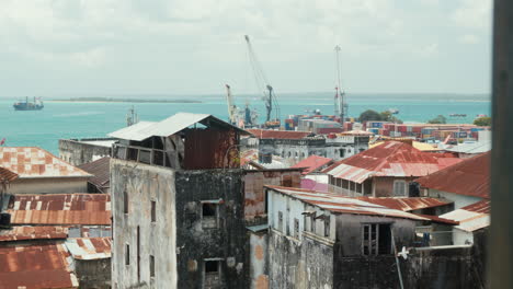 Stone-Town-port-and-aging-buildings-with-ocean-view