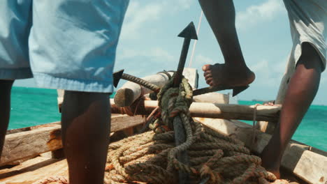 Close-up-of-dhow's-bow-and-anchor-at-sea