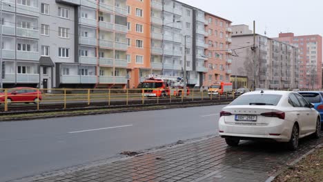 Mercedes-Benz-Atego-truck-of-firefighter-brigade-in-Ostrava-Poruba,-Hlavni-trida-street-in-slow-motion