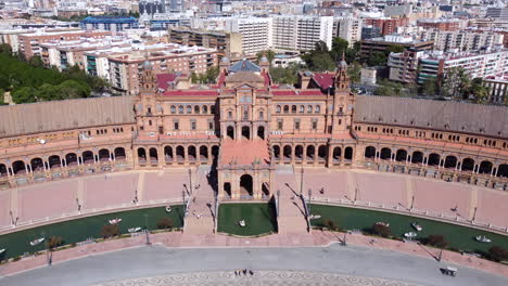 Aerial-pullback-reveals-historic-Plaza-de-Espana-in-Seville,-Andalusia,-Spain