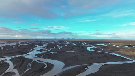 Westman-Islands,-South-Iceland---Panoramic-View-of-Riverbed---Aerial-Sideways