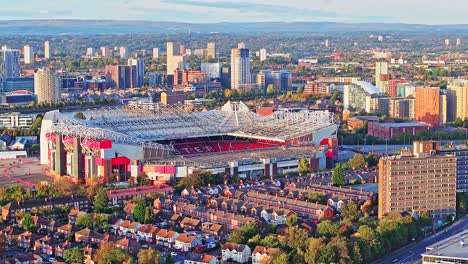 Aerial-view-of-city-in-England,-football-stadium-Old-Trafford