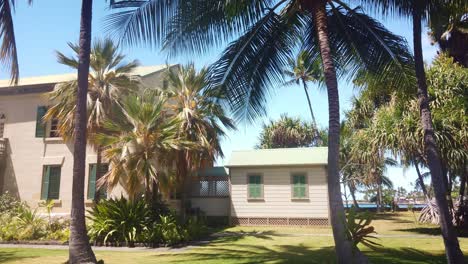Gimbal-wide-panning-shot-of-the-historic-Hulihe'e-Palace-in-Kailua-Kona,-Hawai'i