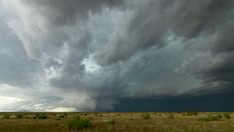 Shelf-cloud-looms-over-the-New-Mexico-landscape-with-mountains-in-the-distance