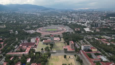 Aerial-view-of-Ciudad-Universitaria-and-the-Olympic-Stadium,-in-the-south-of-Mexico-City
