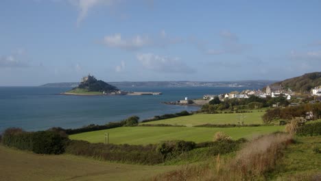 extra-wide-shot-of-St-Michael's-mount-with-the-village-of-Marazion-right-of-frame