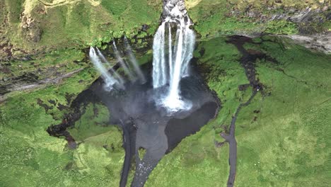 Pullback-Revealed-Seljalandsfoss-Waterfall-On-Sheer-Cliffs-In-Southern-Iceland