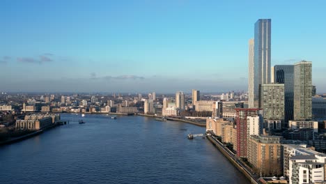 Drone-view-of-Canary-Wharf-and-Docklands-in-London-from-over-the-River-Thames