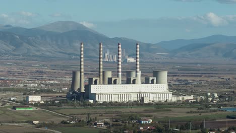 Coal-fired-power-station-plant-with-no-smoke-sunny-day-Clear-sky-wide-shot