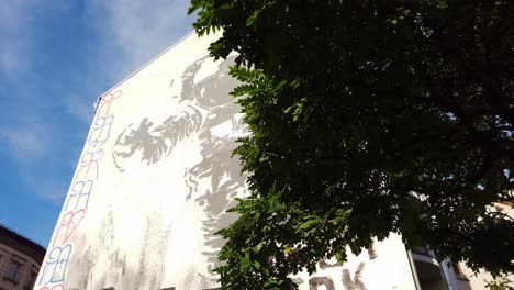 Huge-Astronaut-Mural-in-Berlin-Kreuzberg-at-Facade-of-Old-Building