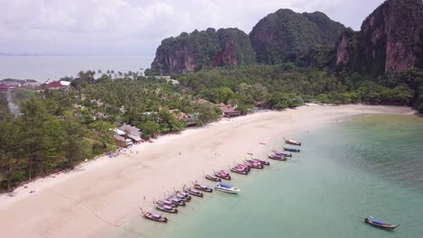 Tropical,-long-tail-boats-in-Krabi-sandy-beach-island-in-Thailand