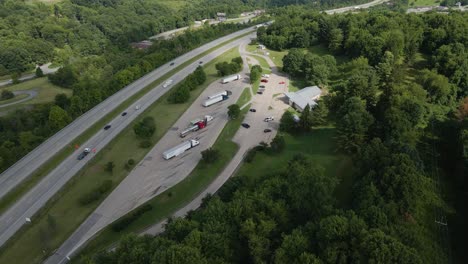Interstate-79-in-West-Virginia-at-Rest-Stop-Pan-Up-Toward-Mountain-Range-Aerial-View