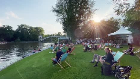 People-Relaxing-at-Spree-River-in-Berlin-on-Insel-der-Jugend-in-Summer