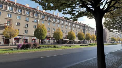 Hlavni-trida-street-in-centrum-of-Havirov-city-built-in-Sorela-style-with-cars-driving-by