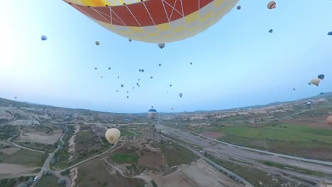 balloon-trip-over-cappadocia-turkey,-colorful-air-balloons,-360