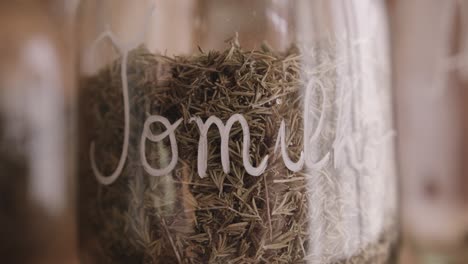 Close-up-shot-of-jar-filled-with-dried-herbs