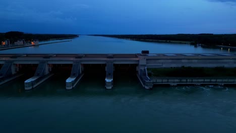 Water-Spillways-Of-Hydroelectric-Plant-On-The-Danube-River-At-Sunset
