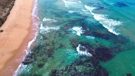 aerial-view-of-ocean,-crushing-waves,tropical-beach-and-reefs,-4k