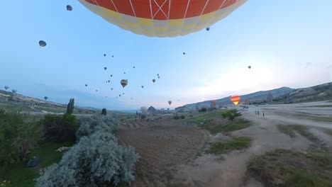 balloon-trip-over-cappadocia-turkey,-valleys-and-rocks