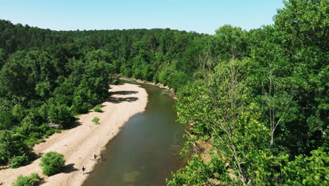 War-Eagle-Creek-In-Benton-County,-Arkansas---Serene-Waterway-With-Green-Foliage
