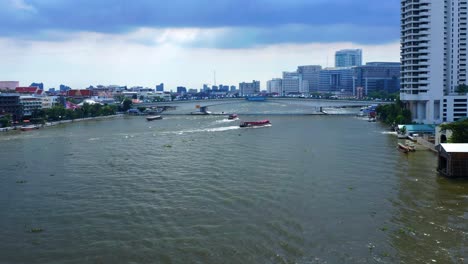 Watercourse-Of-Chao-Phraya-River-With-Passenger-Ship-Sailing-In-Bangkok,-Thailand