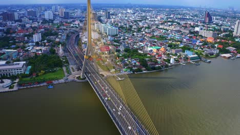 Aerial-View-Of-The-Cable-Stayed-Suspending-Bridge-Of-Rama-VIII-In-The-Metropolitan-Of-Bangkok,-Thailand
