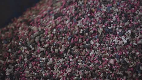 Close-up-shot-of-pile-of-raw-material-particles-in-factory