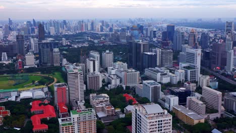 Aerial-View-Of-Bangkok-City-Skyline-With-RBSC-Golf-Driving-Range-In-Thailand