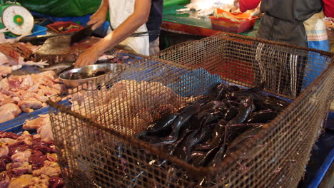 Open-Air-Wet-Market-with-a-basket-of-live-catfish-in-Indonesia