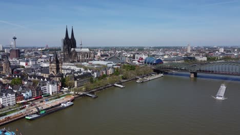Aerial-establishing-view-of-Cologne-Germany-midday,-over-river-canal