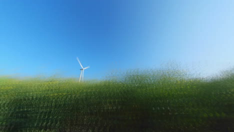 Hyperlapse-Footage-Of-Wind-Farm-Turbine-in-the-Agricultural-Fields-on-a-Sunny-Summer-Day
