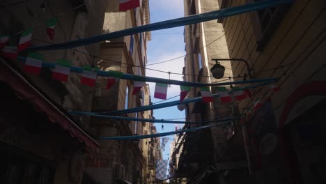 Decorated-streets-with-football-attributes-in-city-of-Naples,-view-from-bellow