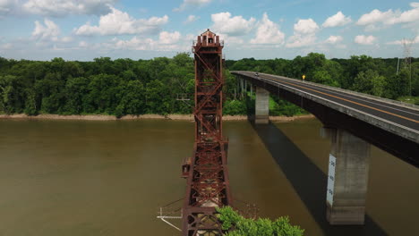 Old-Railway-Bridge-Near-Twin-City-Riverfront-Park-In-Arkansas,-USA---aerial-drone-shot