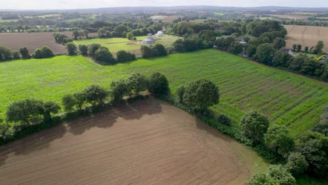 Brittany-rural-landscape-in-France,-aerial-drone-forward-view